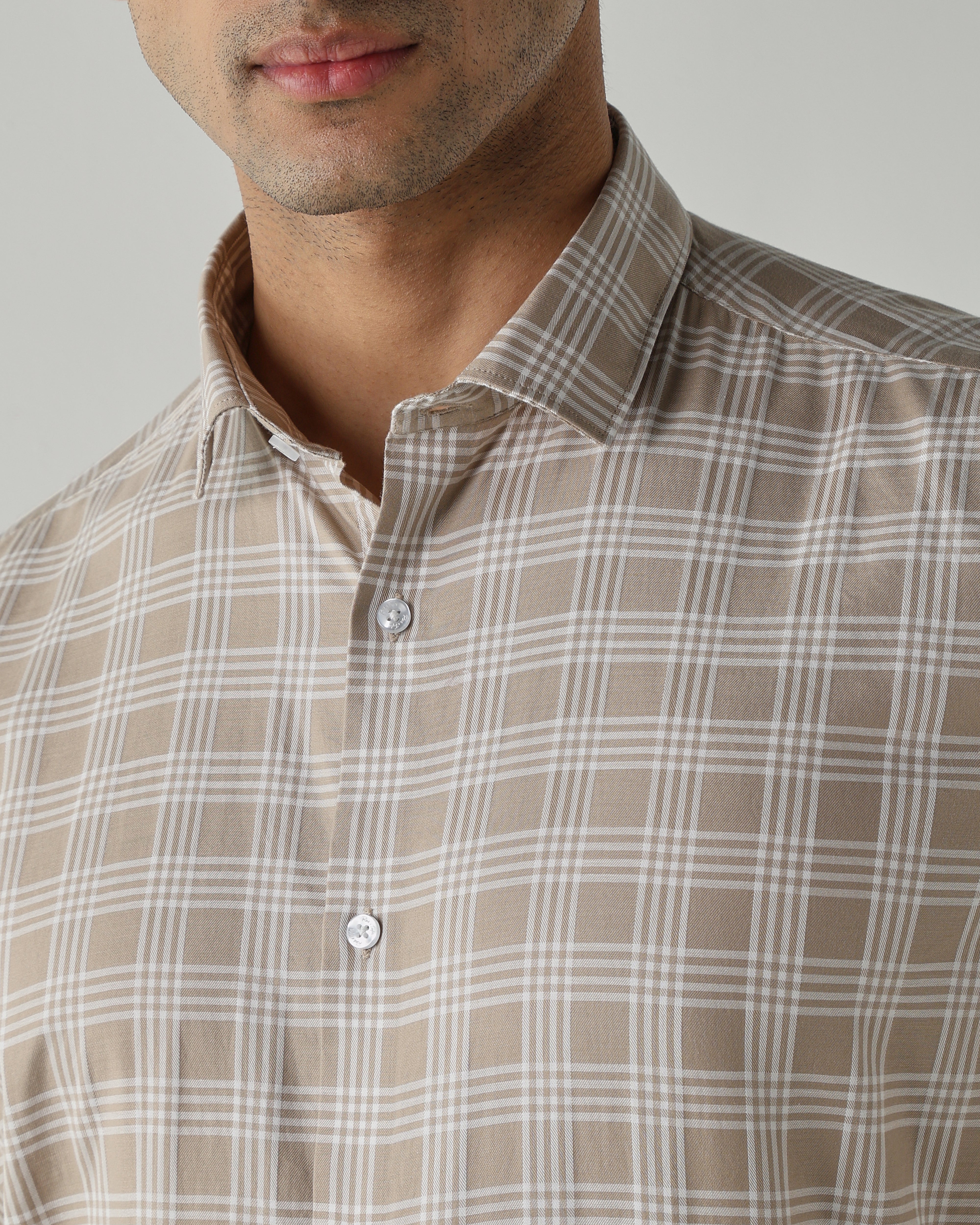 Brown shirts crafted in 100% cotton,