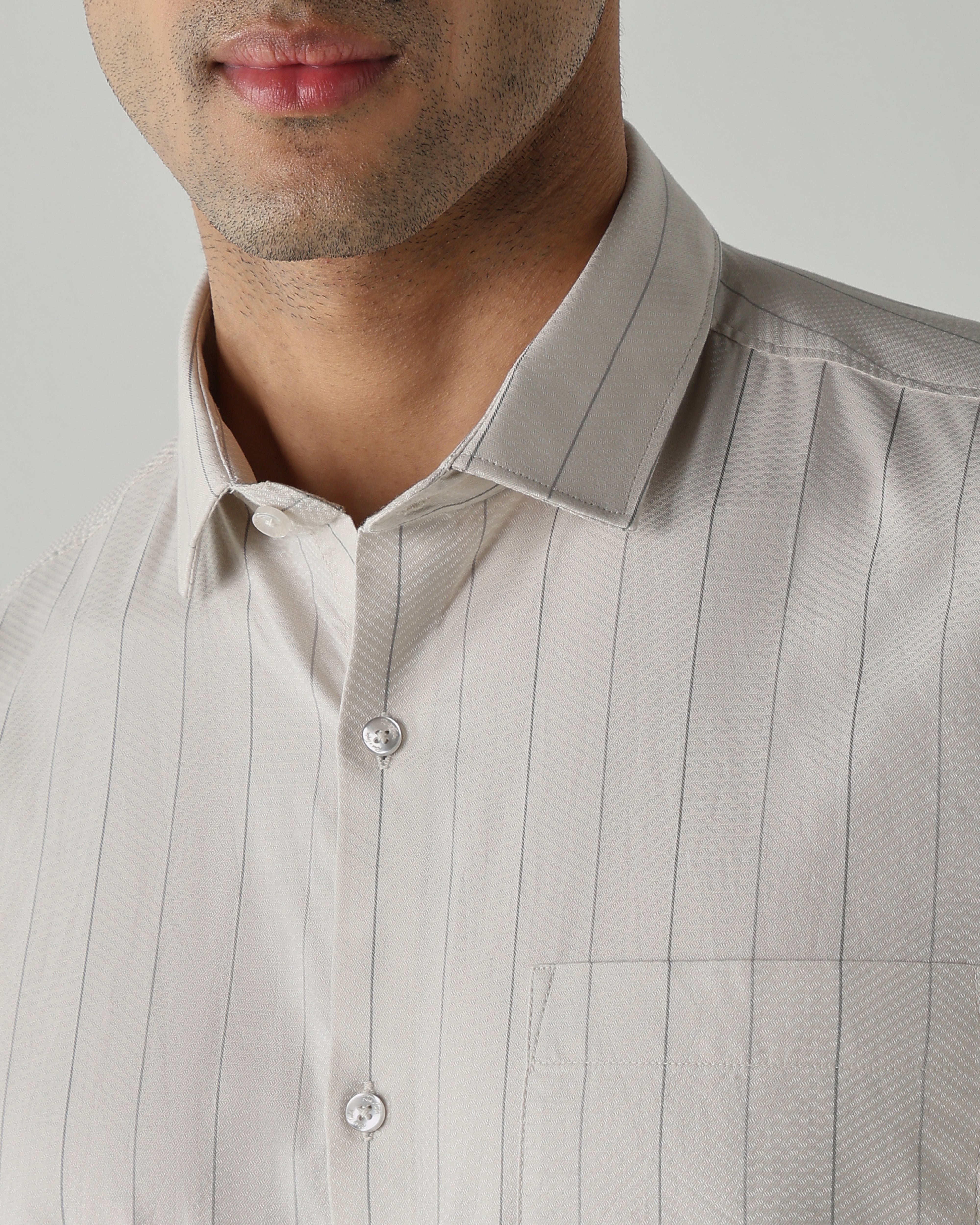 Beige shirts crafted in 100% cotton,