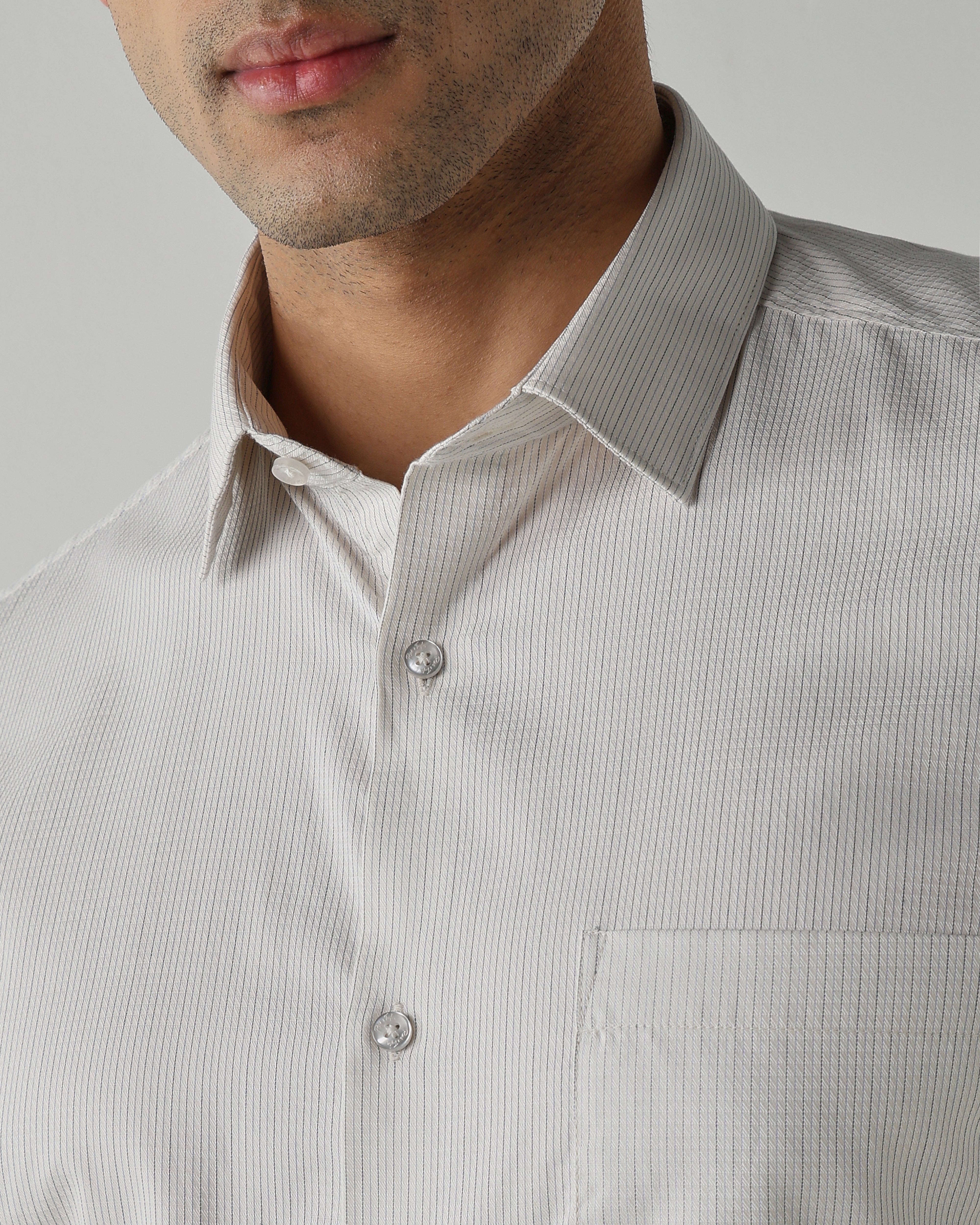 Beige shirts crafted in 100% cotton,